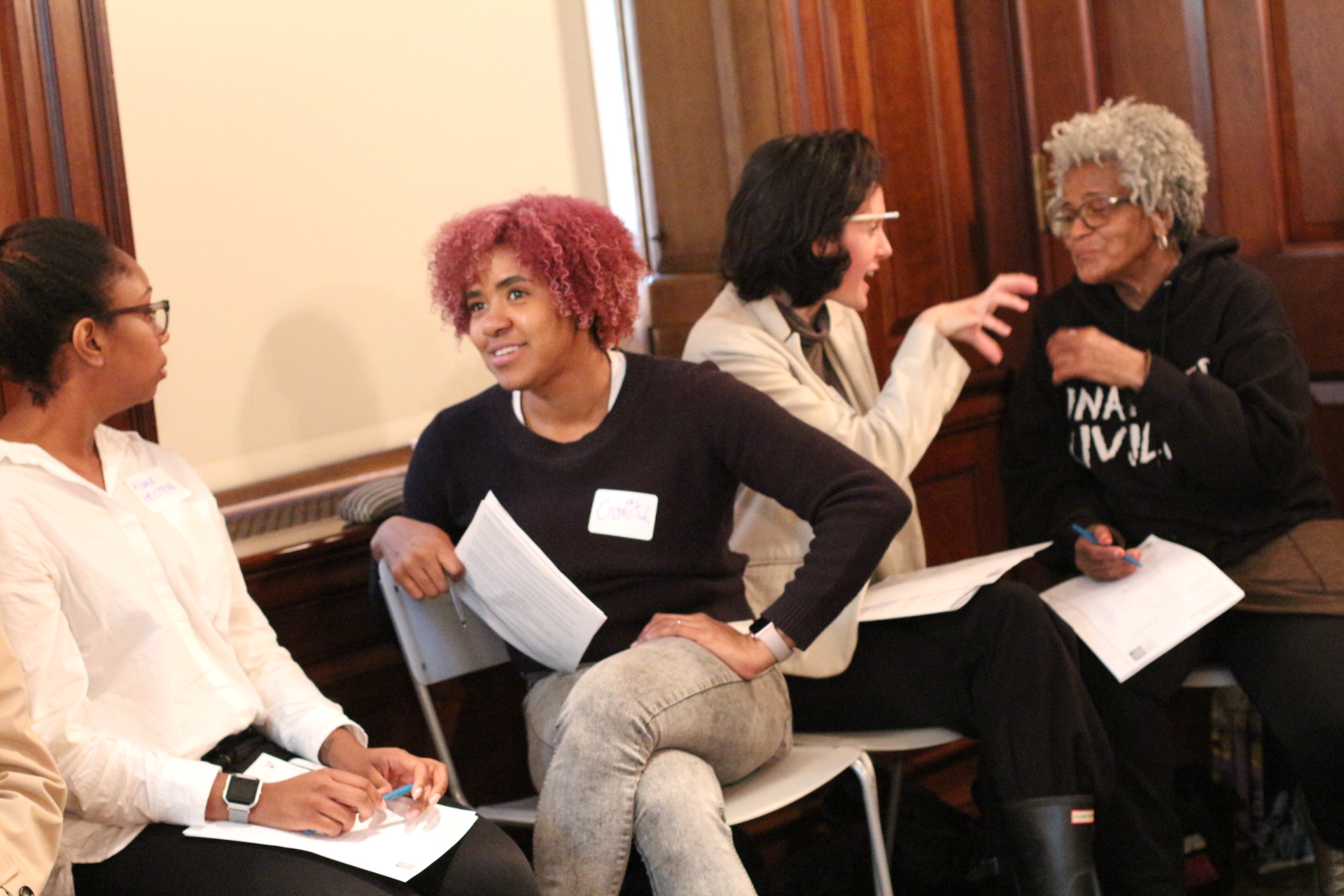 Teachers in conversation during a workshop at the Museum of the City of New York.